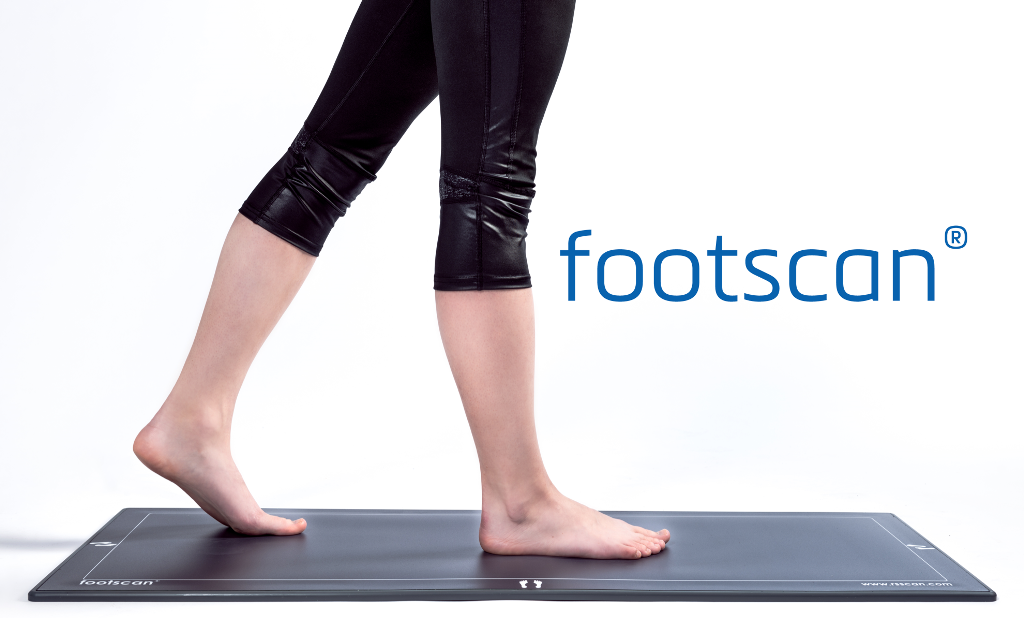 Woman using Footscan to analyse her gait