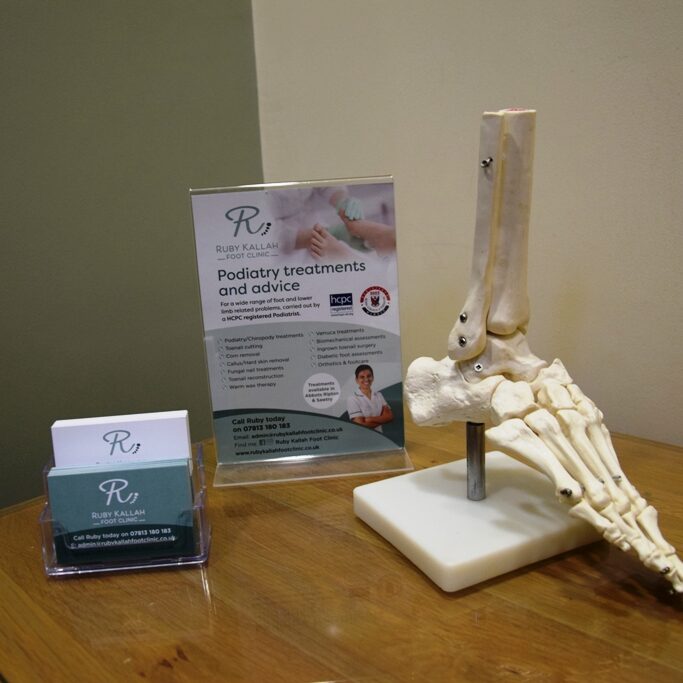 Business cards and a foot skeleton at Ruby Kallah Foot Clinic, Sawtry