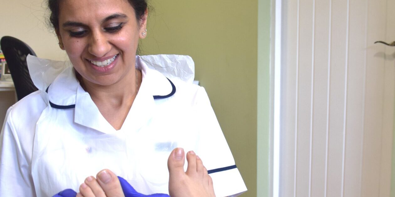 Ruby Kallah, podiatrist treating a patient at Ruby Kallah Foot Clinic, Huntingdon